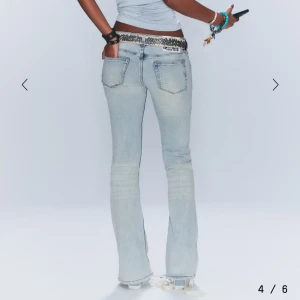 Ljusblå bootcut jeans  -  cheapmonday, slutsålda använda en gång 