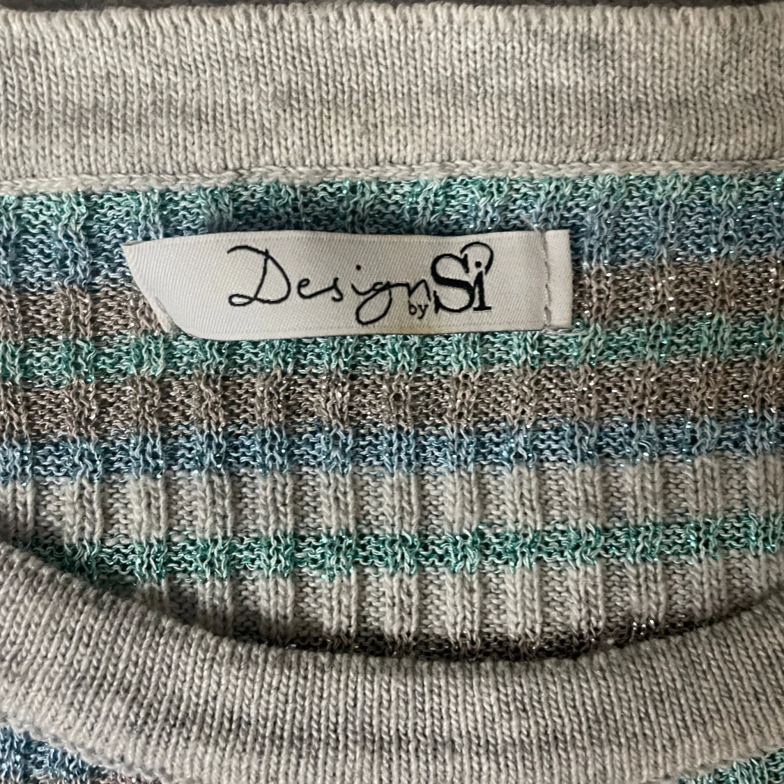 Glittrig blårandig topp från design by si - 1