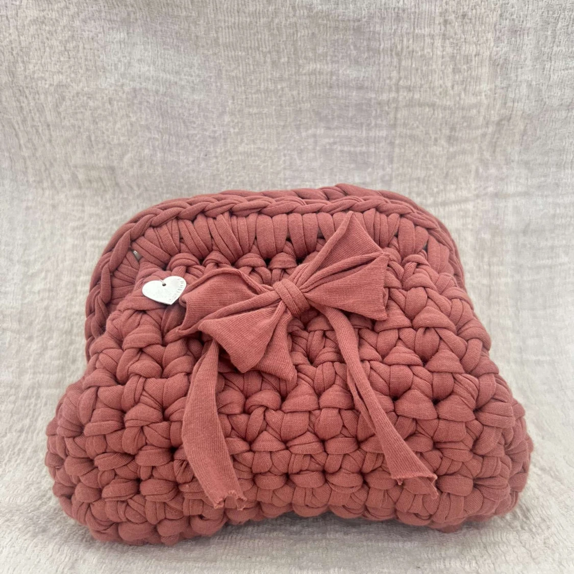 Rosa handvirkad clutch