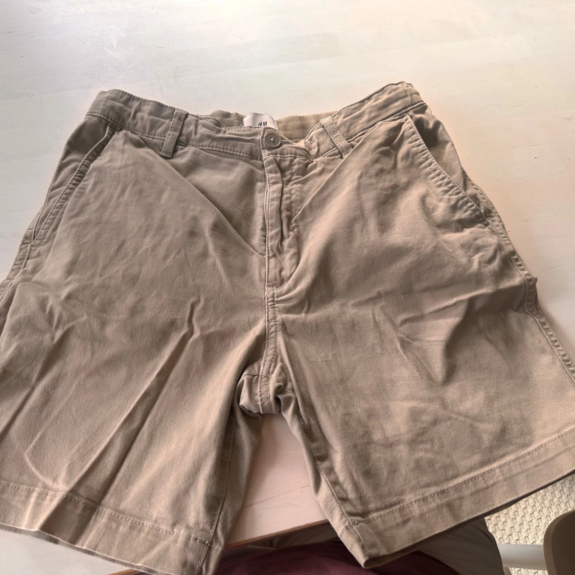 Beige bomullsshorts från H&M