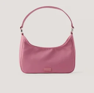 Rosa axelväska från NA-KD - Helt oanvänd. Sista bilden är min