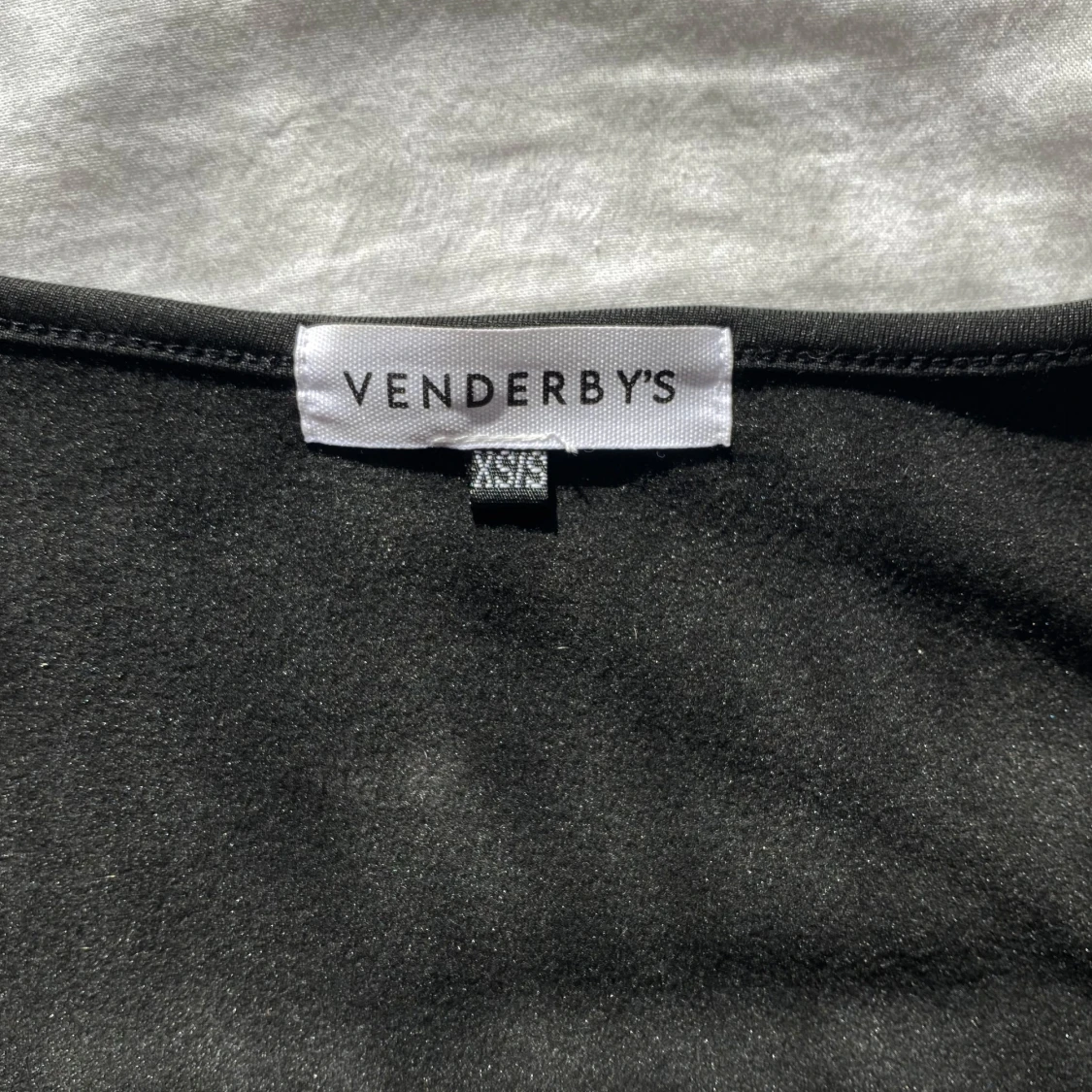 Svart långärmad bodysuit från Venderby's - 2