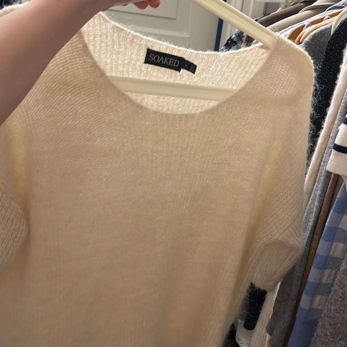 Stickad kortärmad tröja