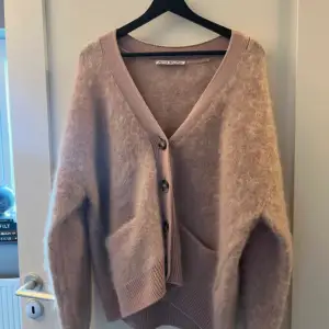 Beautiful oversized knit from Acne Studios with pockets and cool texture. Fits oversized and relaxed. Tagged size XS, fits XS-S.