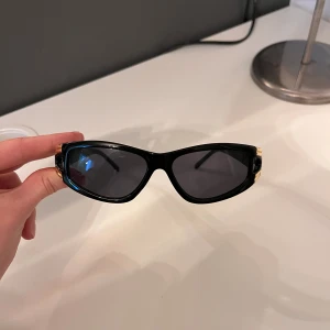 Solglasögon  - Snygga använda 1 gång 