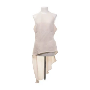 Topp - Super cool topp som är längre i bak och har öppen rygg i strl XS/S 🤍