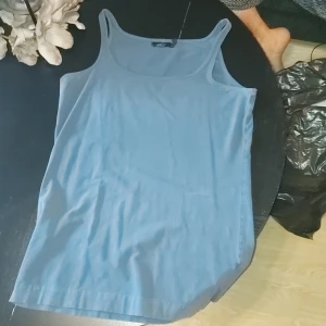 Mörk grå linne - Ett längre mörkt linne som använts bara någon gång TRYCK EJ KÖP NU