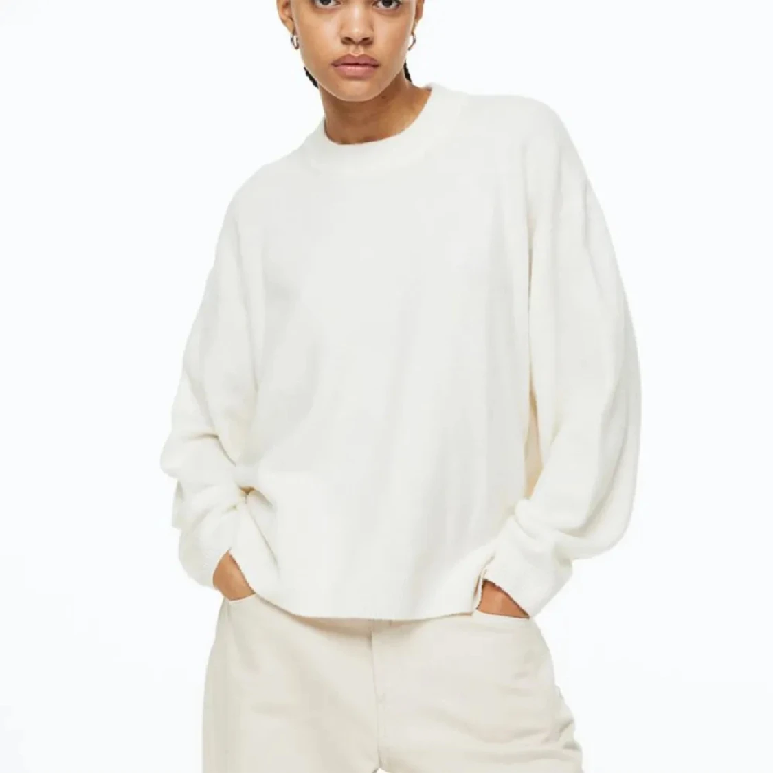 Stickad beige tröja från hm