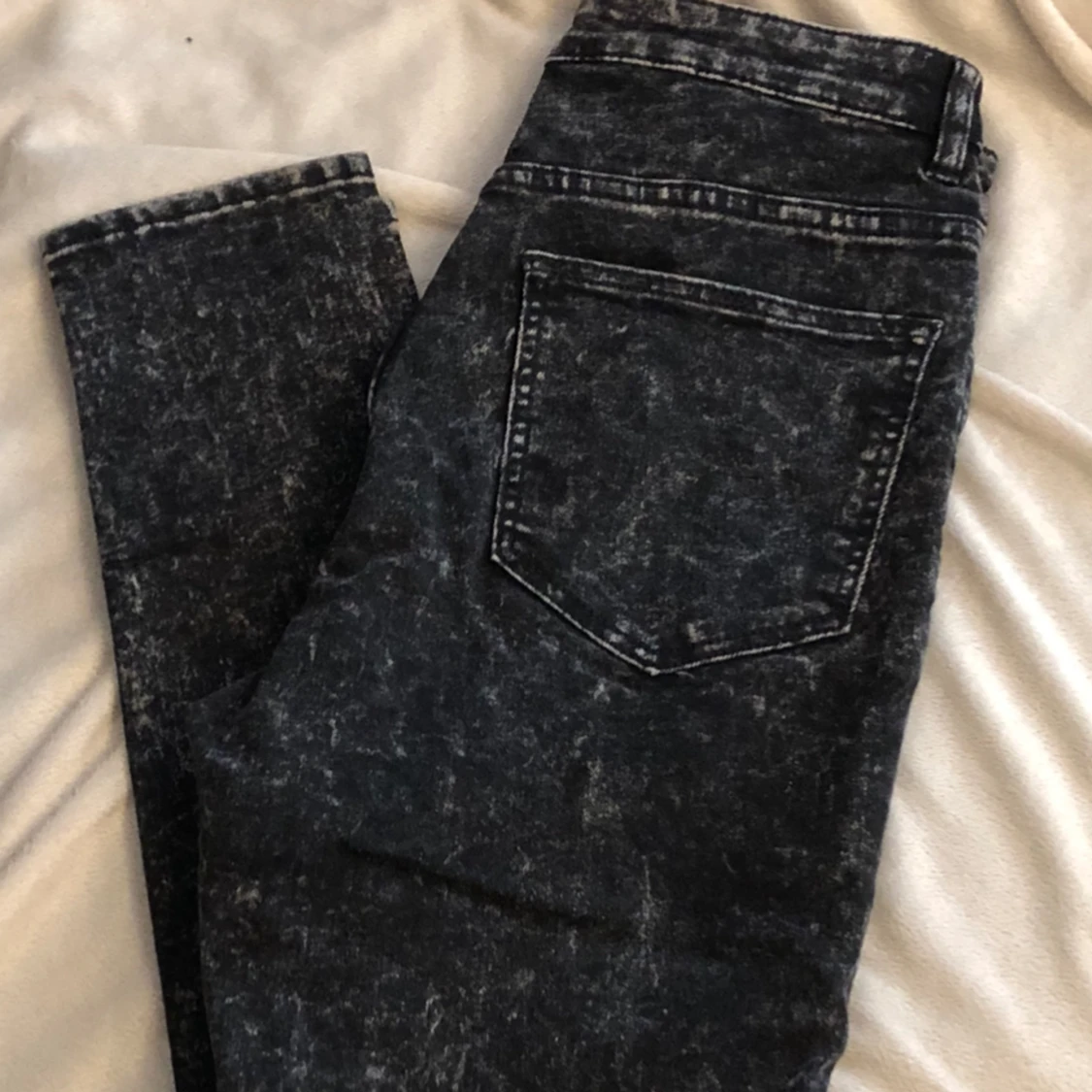 Jeans i svart st 36 / melerade 