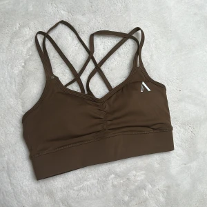Sport bh - Brun sport bh med öppen rygg Oanvänd  Strl: S