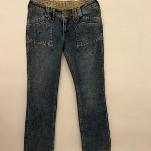 Lågmidjade Bootcut jeans  -  Coola unika jeans  y2k Lågmidjade Bootcut 