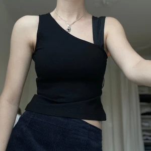 Topp - Svart fin topp från Twist & tango. Knappt använd.