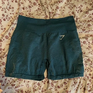 Blåa gymshark shorts   -  Seamless shorts från gymshark i storlek M. Fint skick! 