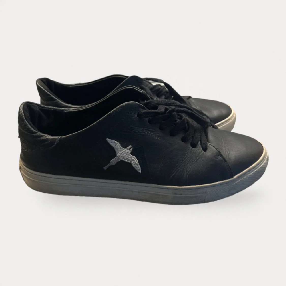 Axel Arigato skor  - 90