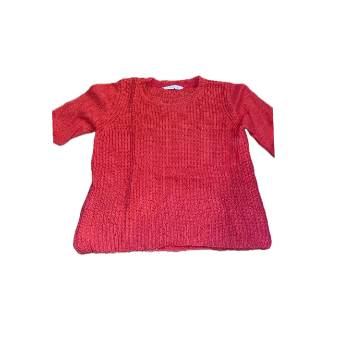 Röd stickad tröja