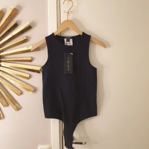 Body - Ny med lappen kvar 