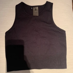 Stronger träningstopp XS - Bekvämt skönt stretchigt tyg. Använd max 3 ggr Svart XS