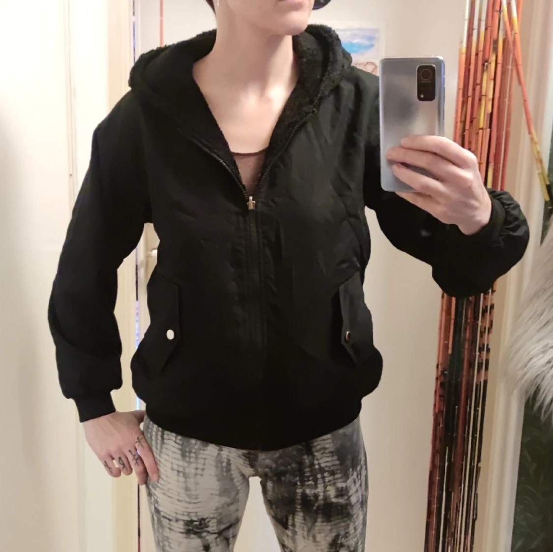 Oanvänd ny jacka vändbar