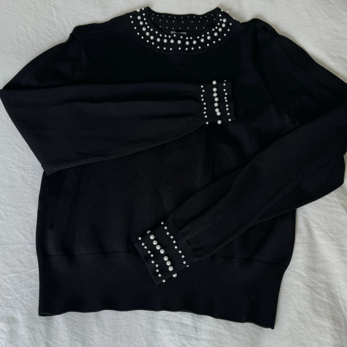 Tröja med pärlor