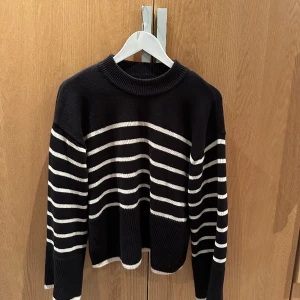 Stickad tröja - En stickad tröja från Gina 