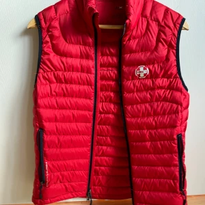 Dunväst  - Dunväst från Ralph lauren Storlek small  Knappt använd 