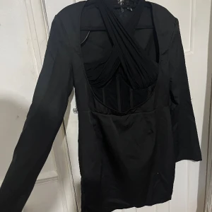 Black dinner dress - Black dress worn once as seen on pictures. Not true to size. Fits size 16/18