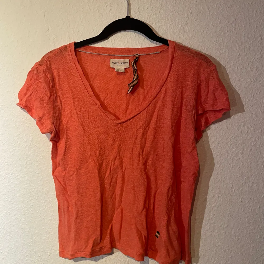 orange rosa t-shirt från Holly & Whyte. skriv för mer bilder och info.. T-shirts.