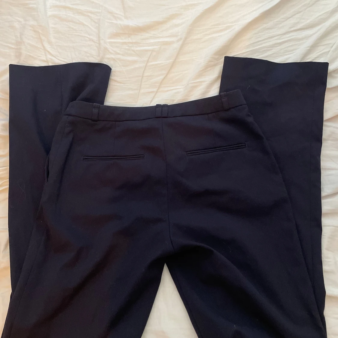 Lågmidjade utsvängda kostymbyxor  - 90