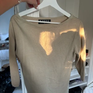 Trekvartsärmad tröja - Bra skick 