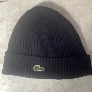 Lacoste mössa - Lacoste mössa