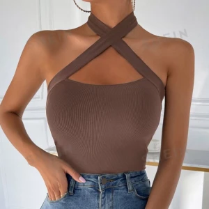 Halterneck topp - Säljer min ribbade halterneck topp som jag endast har använt ett fåtal gånger, skriv för mer info!❤️