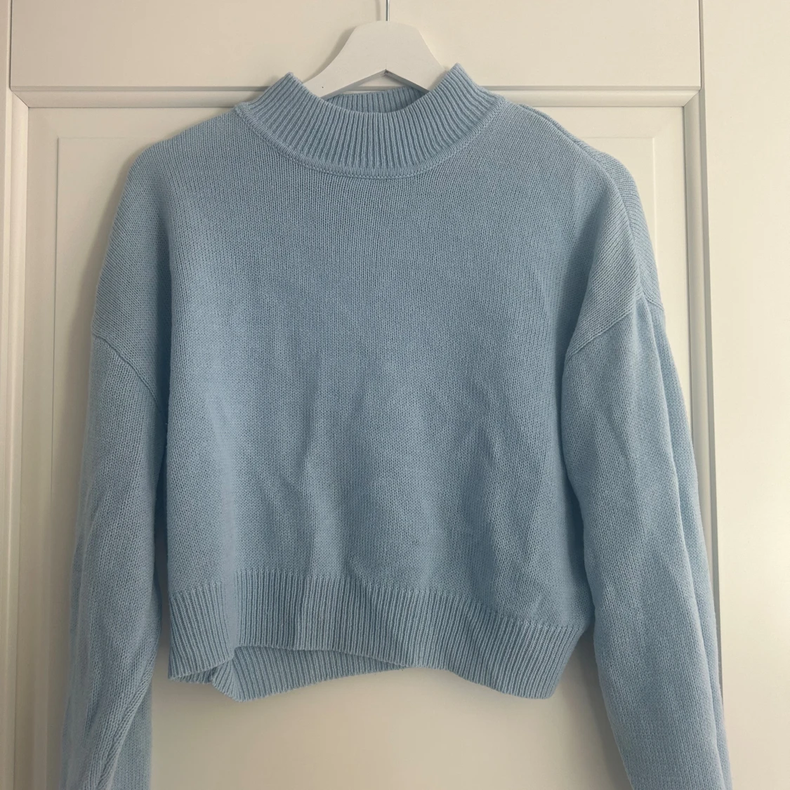 Ljusblå stickad tröja - 90