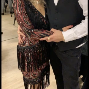 Premium klänning  - Säljer denna klänningen då jag har en i större storlek. Klänningen är helt ny med prislapp passar en xs-s nypris 1800kr 