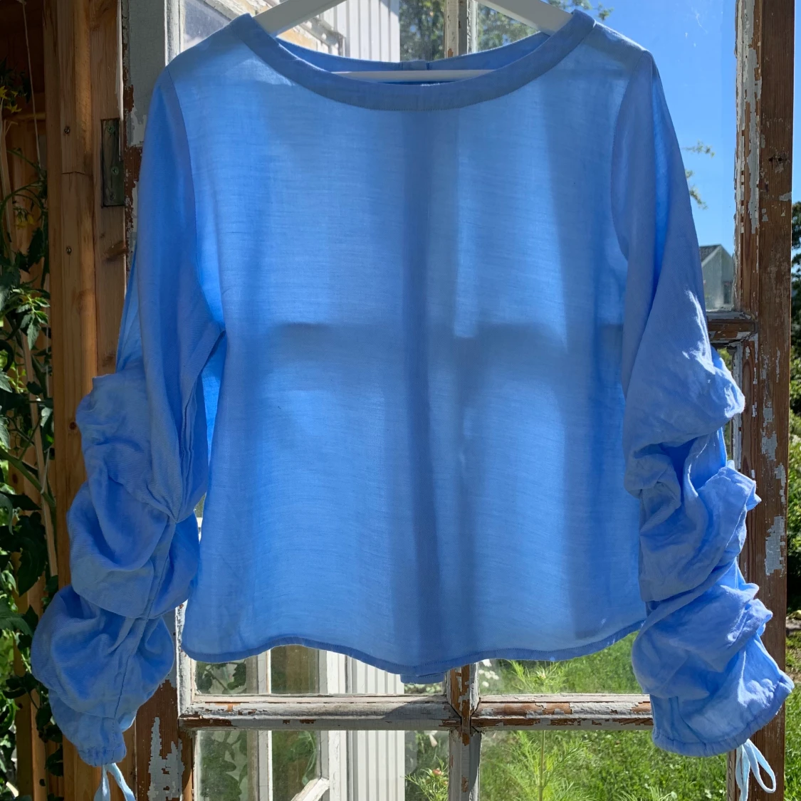 Ljusblå sommarblus - 91