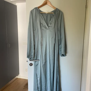 Klänning från HM strl. L - Oanvänd klänning från HM i strl L