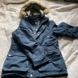 Jacka  - Fin vinterjacka stl 158