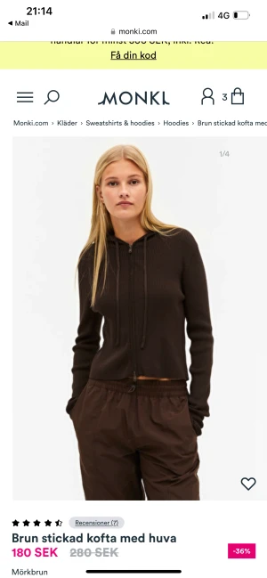 Brun stickad kofta från monki i strl XS - Aldrig använd, prislapp kvar! Passar storlek XS och S. Stretchigt stickad material och har en hood!