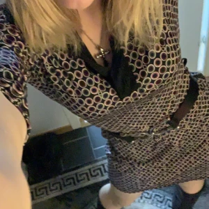 Vintage klänning 70s - Vintage klänning i 70-tals stil, köpt på beyond retro, stretchigt material 