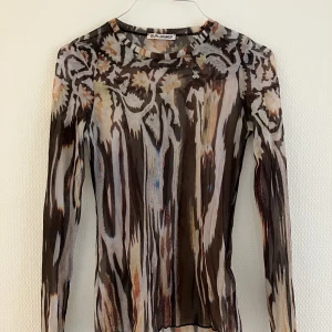 Our legacy - OL meshtröja, inget att anmärka på vad gäller skick. Passar xs-s. 