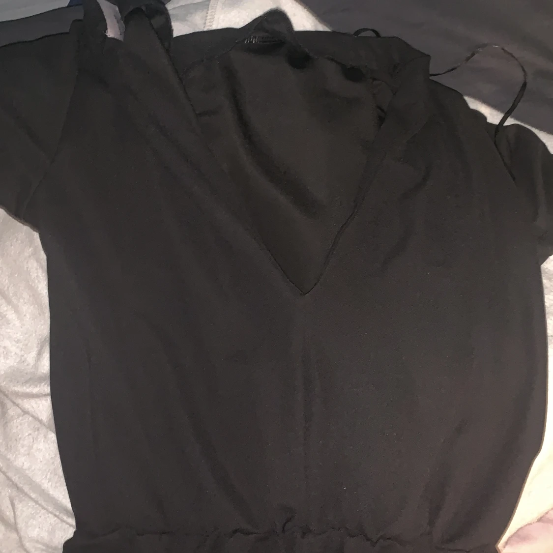 svart jumpsuit storlek L - 91