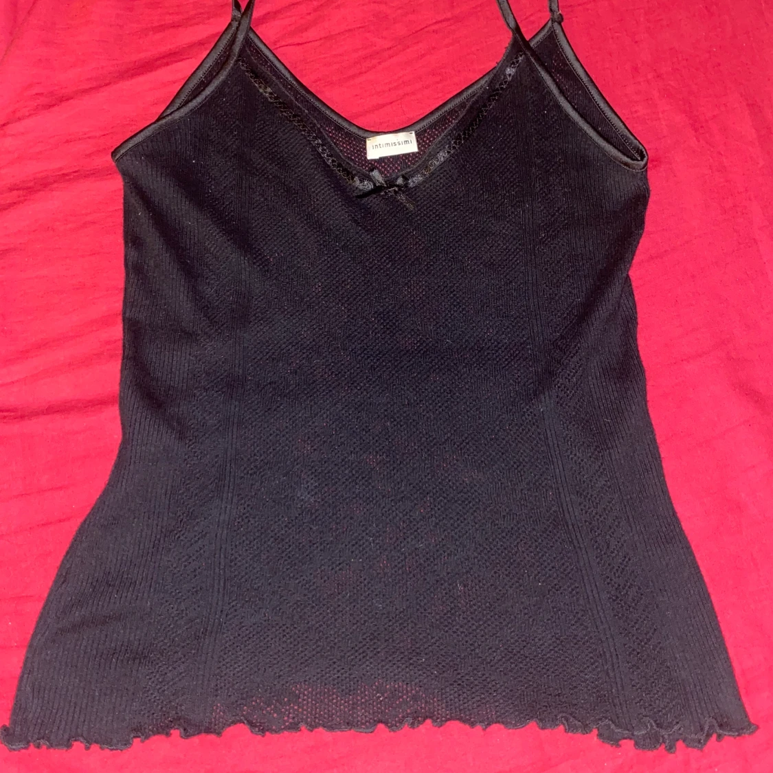 svart eyelet linne med rosett