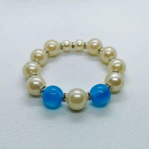 Pärlarmband - Vackert armband i stretchig tråd. Frakt ingår i priset 