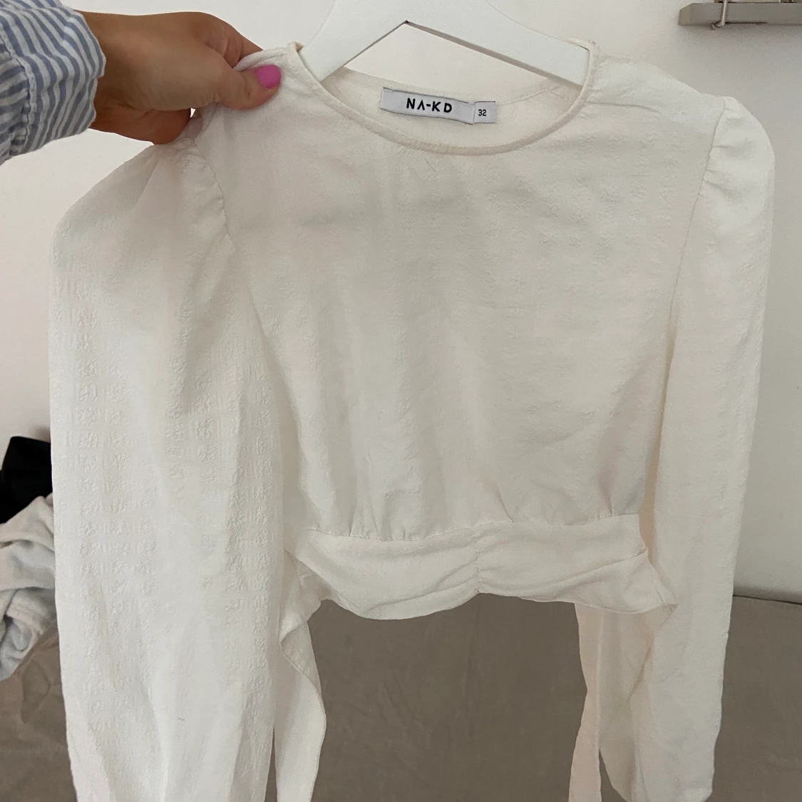 Blus med öppen rygg