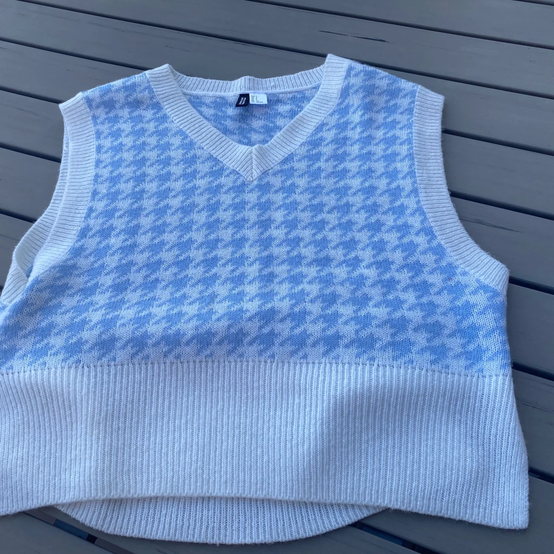 Blå vit mönstrad väst