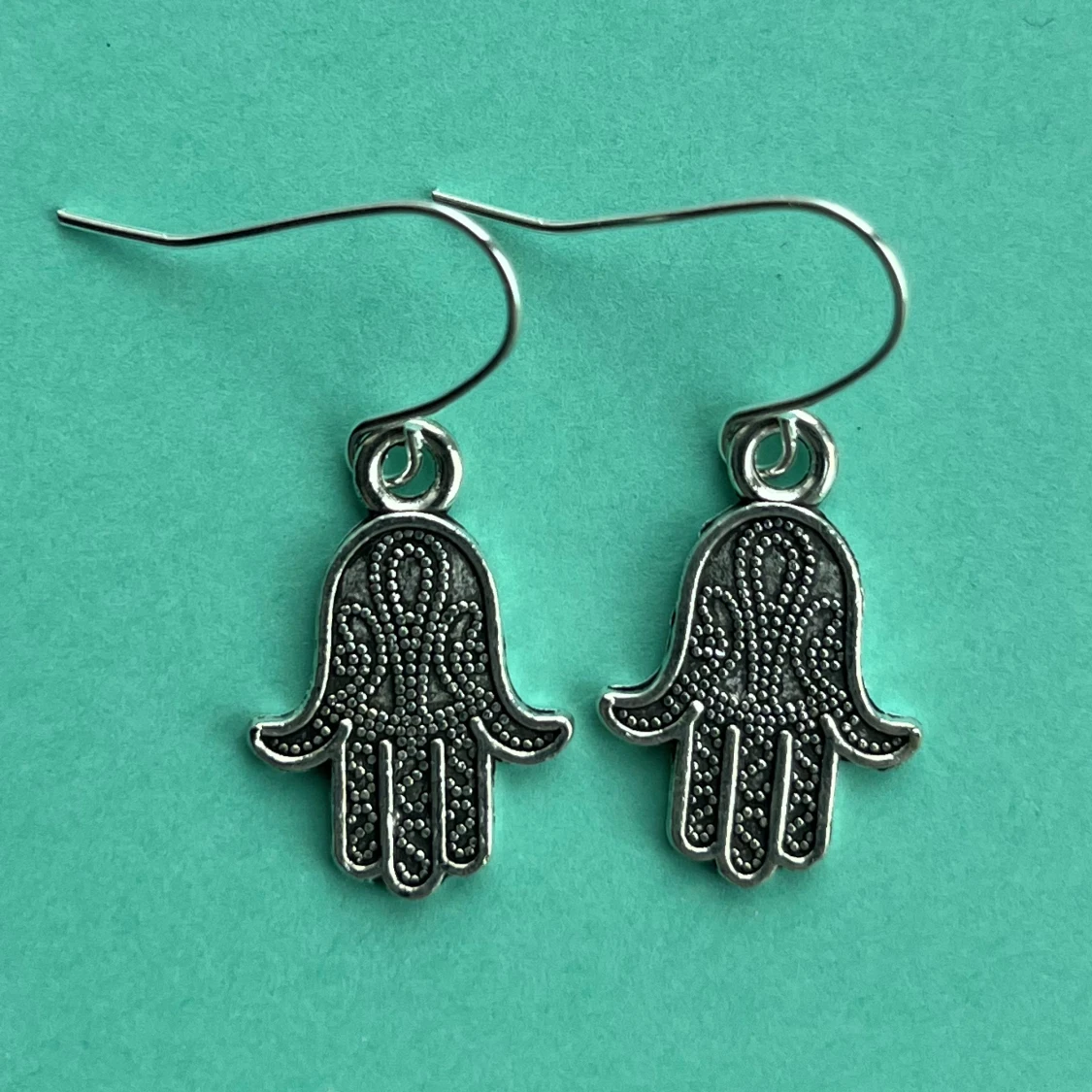 Hand örhängen 💚