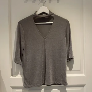 Grå/silvrig blus - Grå/silvrig blus storlek S