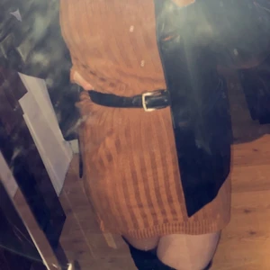 Stickad kläning - Varm och mysig kläning