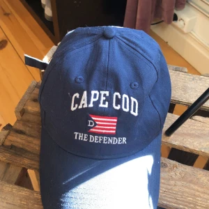 CAPE COD marin blå kepa - Nytt skick Aldrig använd Marin blå färg CAPE COD