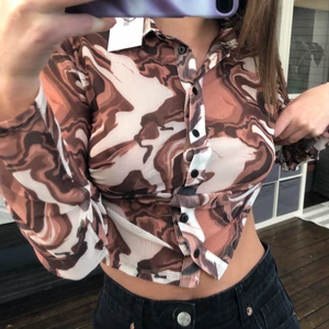 Skjorta mönstrad  - Från Chiquelle storlek M lappen sitter kvar 