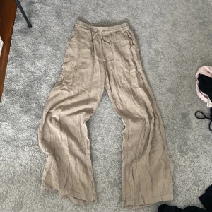 Linne byxor - Linne byxor, skit sköna typ begie bruna